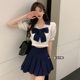 Pure and sweet suit female summer new age-reducing bow top + pleated skirt hot girl jk uniform two-piece