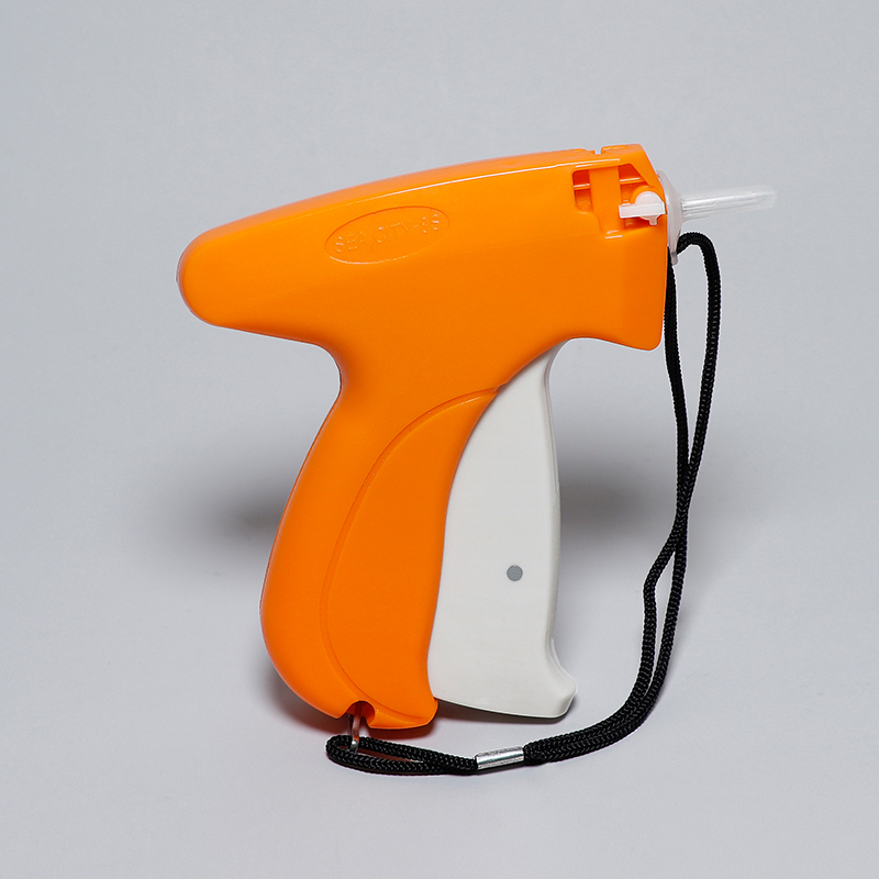 Clothing tag gun trademark gun tag gun beatings sock gun pointer pointer needle spot