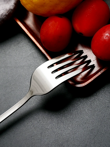 Западная еда тянет на стейк -песок с длинной ручкой