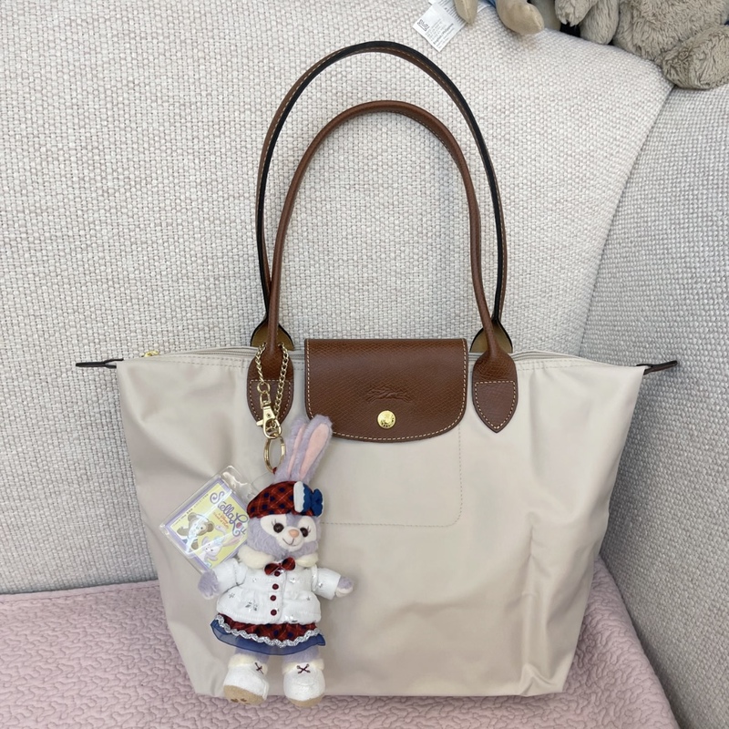 In Stock Longchamp Medium-Sized Handbag in Pebble Paper, White, Black, Pistachio, Graphite Gray, Lime, Beige In Stock Longchamp Medium-Sized Handbag in Pebble Paper, White, Black, Pistachio, Graphite Gray, Lime, Beige