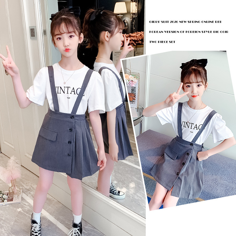 Korean version of the girl's summer dress new middle child big child primary school girl short-sleeved letter top baby bag short skirt suit