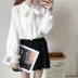 Phụ nữ mùa thu khí chất Nhật Bản thắt nơ đơn giản dài tay áo sơ mi màu trơn học sinh áo sơ mi dáng dài nữ tay lỡ Áo sơ mi dài tay