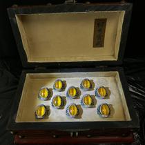 Antique gold and silver jewelry a box of yellow cats eye rings from the Qing Dynasty collected in the countryside and a lacquerware box