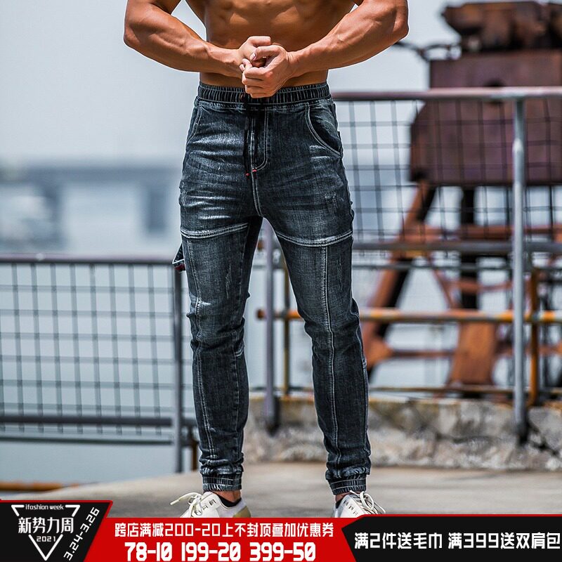Line iron wolf fitness jeans men's autumn and winter sports slim fashion models show muscle elasticity can squat smoke pipe pants