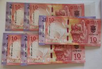 A pair of Macau Bank of China lion banknotes of $10 and $20 ending in 3 with the same number 2 numbers without 4 and an optional number ending in 8