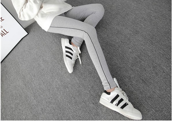 Mùa xuân và mùa thu dày quần legging thể thao màu trắng sọc dọc kéo dài dệt kim cotton đen chân chín quần quần ấm mùa đông phụ nữ