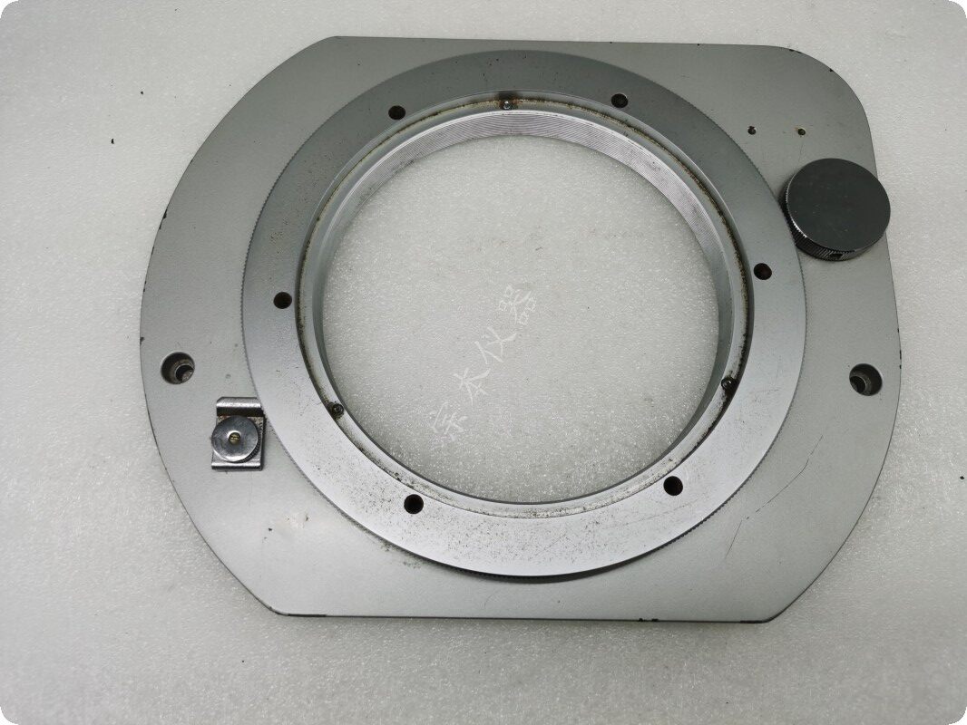 The NIKON OLYMPUS tool microscope works with a rotating slip