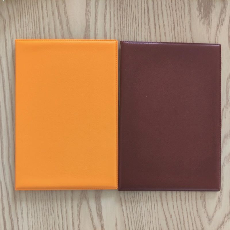 The Cover Is Gilded, the Master's Seal Book Has a Bright Orange Cover, and the Red Cover Book Has a Maroon Cover