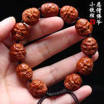 Olive stone carving purely handmade by Sunan Gong small seed red iron stone evil monk Buddha olive Huwen toy bracelet for men and women