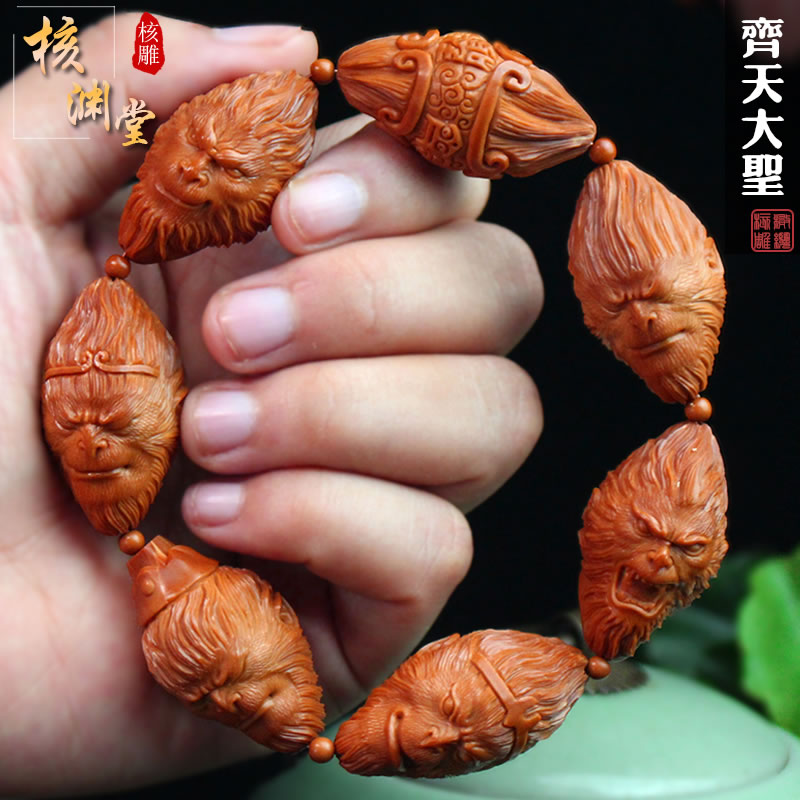Zhoushan Sugong pure hand carved olive core carving Qi Tian DaSheng Sun Wukong monkey head bracelet olive Hu Wen play hand string