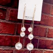 South Korean personality exaggerated long and large pearl earrings suitable for large face expats with thin flow Su earrings minimalist earrings