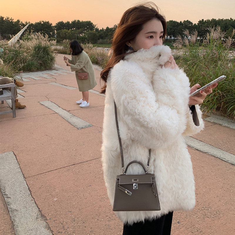 2021 new Korean version of the fur one-piece lamb coat women's winter long version loose and wild thickened wool coat