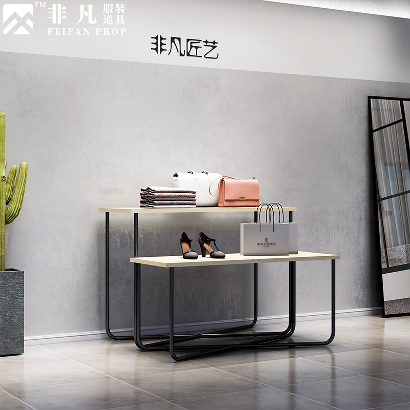 Extraordinary clothing store solid wood high and low table men's clothing store window shoe bag running water table floor-standing middle island display table