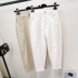 Mùa xuân xé quần jeans nữ trắng Han Fan quần lửng mỏng củ cải quần hậu môn sinh viên quần chín - Quần Harem
