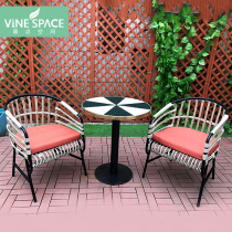 Creative custom coffee shop milk tea shop Model room Sales department Soft decoration company combination rattan chair three-piece balcony