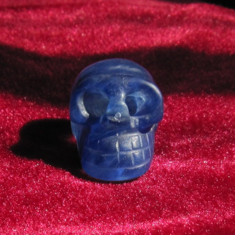 Crystal skulls skull swinging pieces in the shape of a