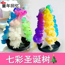 Colorful Christmas tree in childhood open snowflakes paper tree magic tree watering flowering crystallization science experiment Christmas toys
