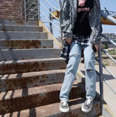 97BONES 2019 ripped jeans hip hop loose vintage washed casual pants men's and women's wild straight pants