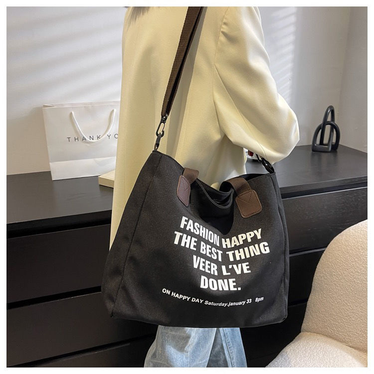2022 Spring and summer new large - capacity canvas bag simple fashion handbill slip shoulder - bag letter printed Tot bag