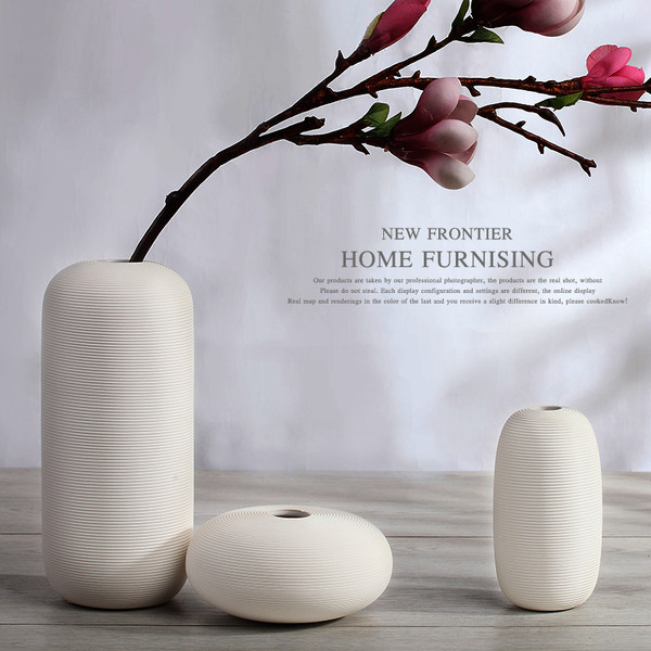 莱恩斯 现代简约风 陶瓷花瓶 优惠券折后¥9.9起包邮(¥39.9-30) 莱恩斯 现代简约风 陶瓷花瓶 优惠券折后¥9.9起包邮(¥39.9-30)