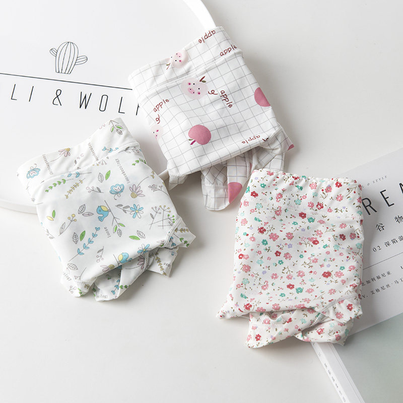 Lightweight underwear women's ice silk style mid-waist cute print Japanese girl student seamless milk silk ladies briefs