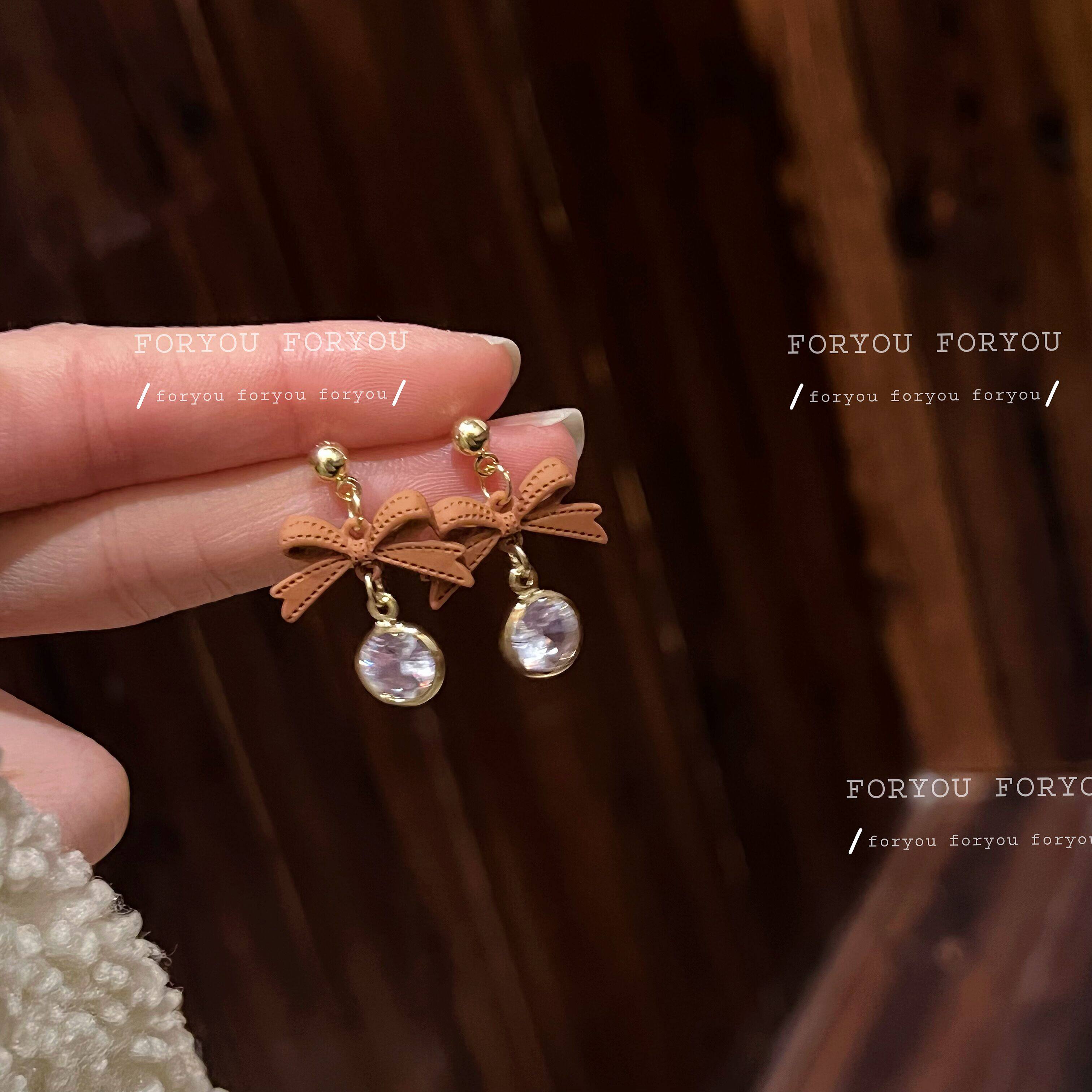 Butterfly knot ear nail woman 2022 new brown earrings matt high level sensation inlaid drill tide small ear clip without ear clip