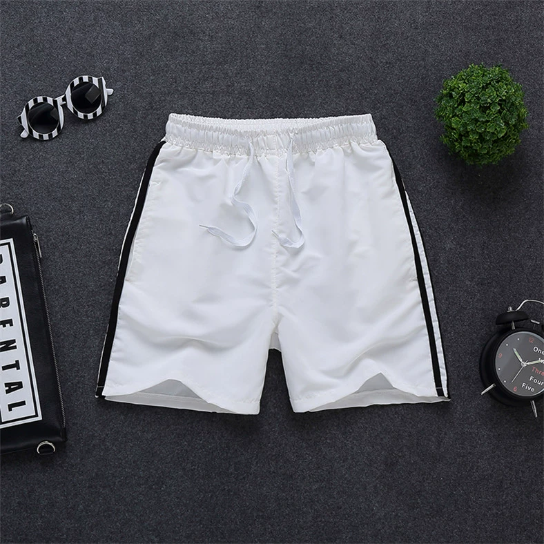 Mùa hè quần short nam ba quần Hàn Quốc thường 3 điểm quần nam bãi biển mùa hè quần lỏng quần lớn triều quần túi hộp nam