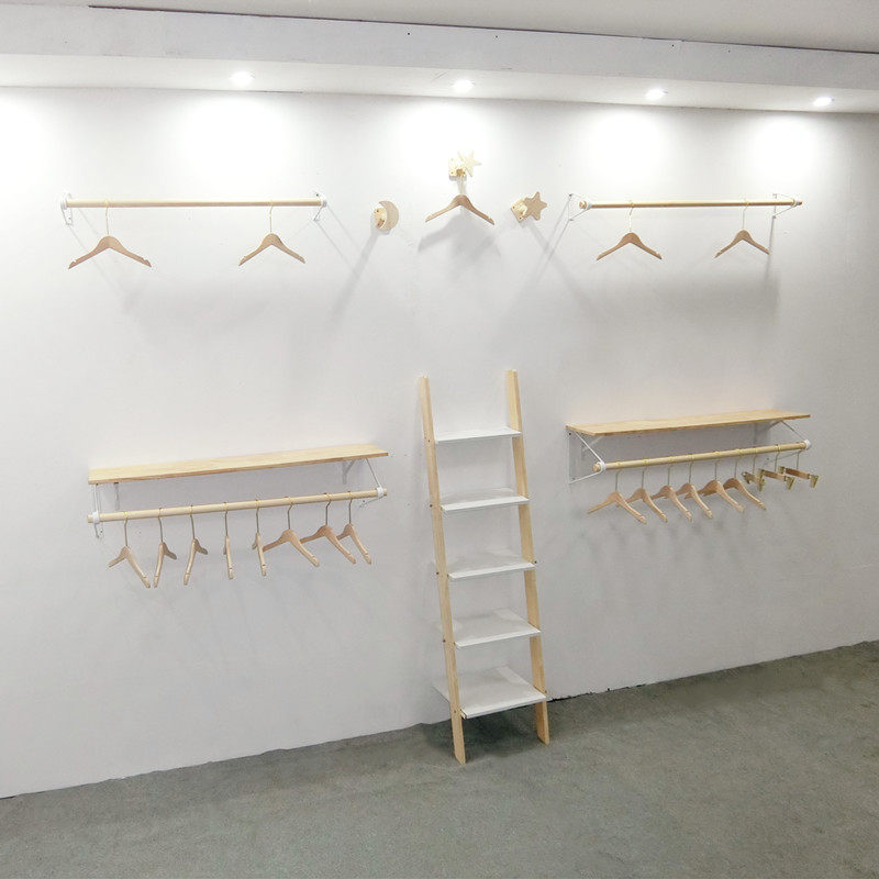 Clothing store children's clothing display stand solid wood on the wall children's clothing log color clothes rail women's clothing store front side hanger