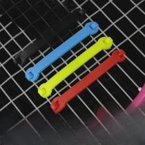 Tennis racket shock absorber buckle strip