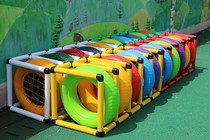 Kindergarten tire sense rolling ring drilling hole tire rack children's changeable rolling ring color multi-purpose rolling plastic tire rack