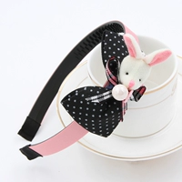 Коричневый маленький кролик точка черный