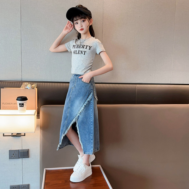 ເດັກຍິງ denim skirt summer 2023 ຮູບແບບໃຫມ່ຂອງເດັກນ້ອຍແບບສະບາຍ skirt ຍາວແບບອະເນກປະສົງ skirt ສໍາລັບເດັກຍິງແລະເດັກນ້ອຍອາຍຸ