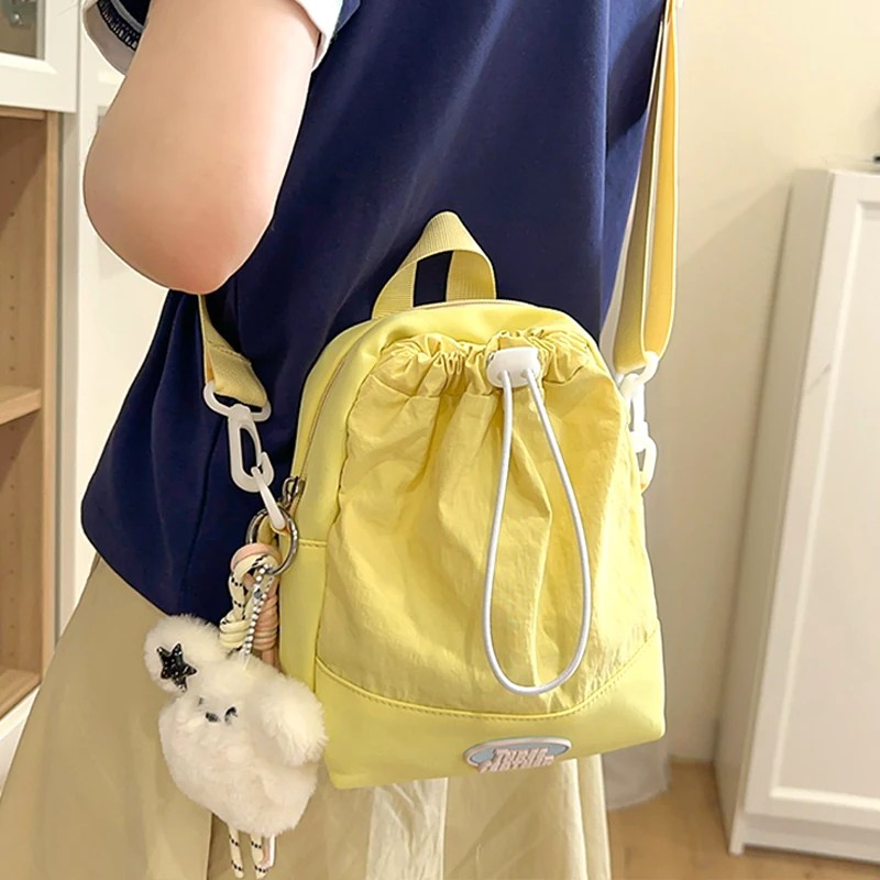Niche design water cup bag mobile phone bag water bottle bag water cup portable bag casual cute one-shoulder cross-body small bag for women