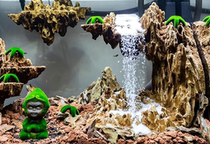 Quicksand waterfall fish tank landscaping handmade hydrodynamic rockery stone Qinglong stone dynamic grass tank
