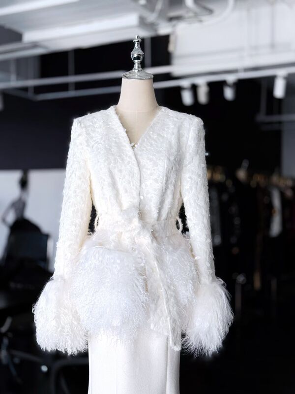 Designer Style Autumn and Winter High-End Coat with Feather Hem and Cuffs, Lamb Wool Accents, and a Stylish Chanel-Inspired Belt for Women Designer Style Autumn and Winter High-End Coat with Feather Hem and Cuffs, Lamb Wool Accents, and a Stylish Chanel-Inspired Belt for Women