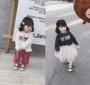 儿 2018 trẻ em mới phiên bản Hàn Quốc áo thun cotton dài tay áo sơ mi nước ngoài chạm đáy áo sơ mi trắng áo thun trơn bé trai