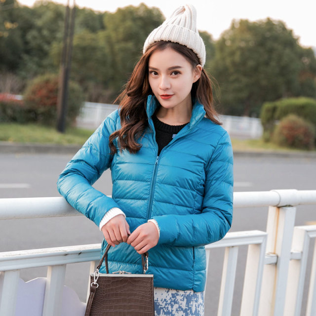 Lightweight down jacket women's 2023 new short white duck down fashion hot style autumn and winter large size light jacket anti-season