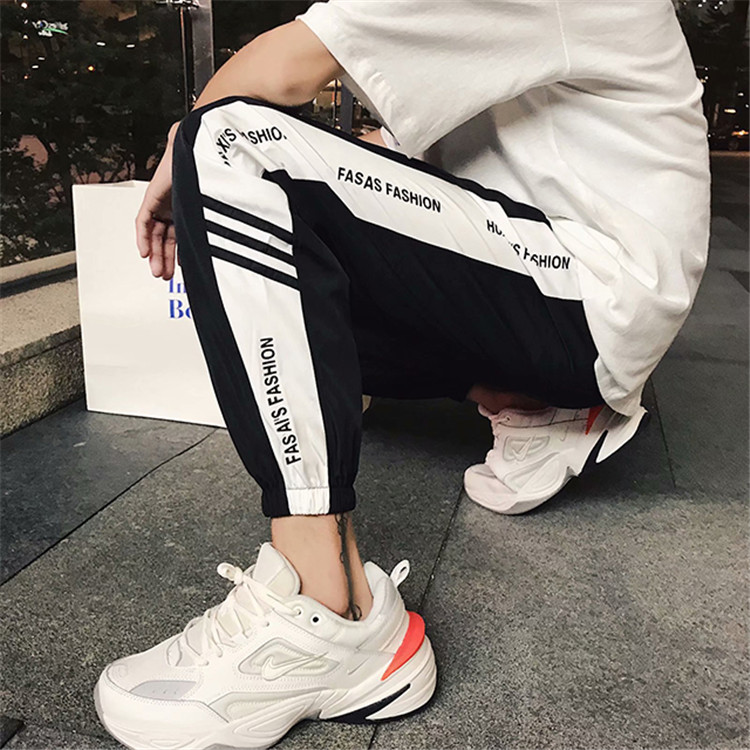 Quần hip hop phong cách Hồng Kông nam thu đông phiên bản Hàn Quốc của xu hướng quần lửng bf gió cộng với nhung dày 9 quần thông thường quần giữ nhiệt nam