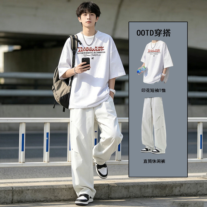 Summer Casual Suits for Men Are Popular This Year, with a Trendy High-End Short-Sleeved Top Paired with Casual Pants in a Two-Piece Set Summer Casual Suits for Men Are Popular This Year, with a Trendy High-End Short-Sleeved Top Paired with Casual Pants in a Two-Piece Set