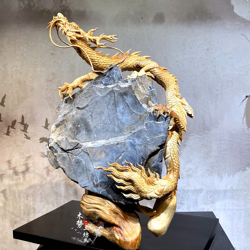 Cliff Began embraces the stone pillar of the Pillar Pillar Mailfo Carving Omnipotent and wooden carving dragon Fengqi Tian Tang San Sun Wukong