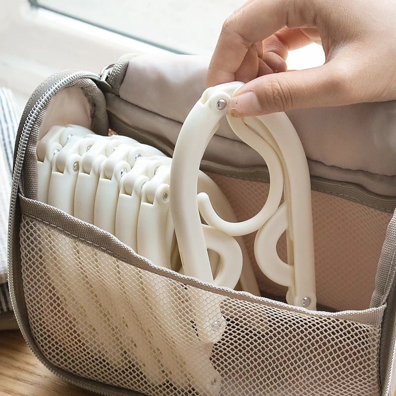 Travel folding hanger portable multi-functional travel artifact clip drying socks dormitory clothes support household children 1