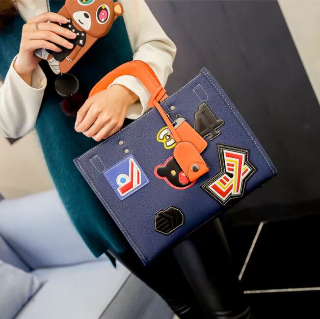 2018 xuân hè mới thời trang châu Âu và Mỹ túi xách lớn đeo vai nữ màu retro phù hợp với túi xách huy chương túi xách nữ juno