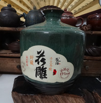 The bottle collection is a 5 pound of large bottle ceramic kiln beautiful yellow wine bottle wine alcohol in physical photo