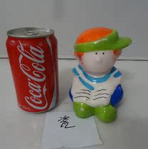 Old piggy bank early boy piggy bank ceramic ornaments doll old toys used with paint removal and wear physical photos