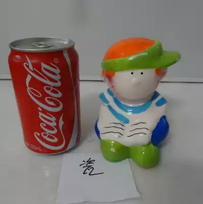 Old money tube early boy piggy bank ceramic decoration doll old toy used with paint removal and wear