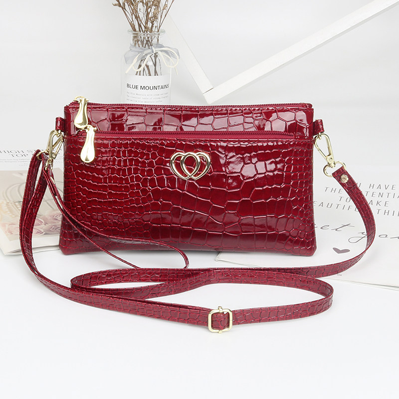 新作レディースハンドバッグ、おしゃれな光沢のあるエナメルレザーのクロスボディバッグ、カジュアルなクロコダイル柄クラッチバッグ、小型レディースバッグ。