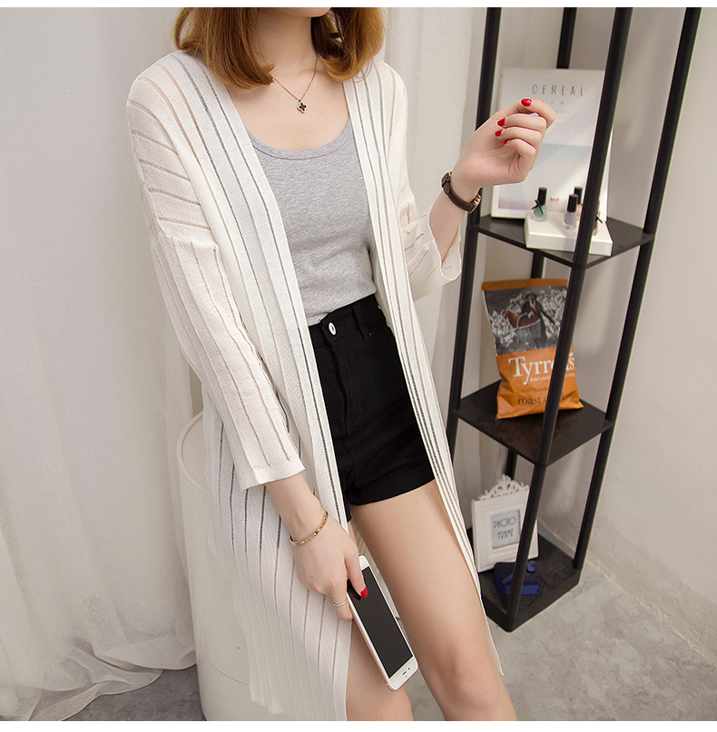 Áo chống nắng nữ màu rắn điều hòa không khí áo sơ mi khăn choàng rỗng Phiên bản Hàn Quốc của phần mỏng lỏng trong phần áo len dài là áo khoác dệt kim mỏng áo khoác cardigan nữ form dài