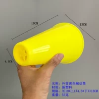 10 внешнеторговых желтых микрофонов (верх 4,5*низ 13*высота 19,5 см)