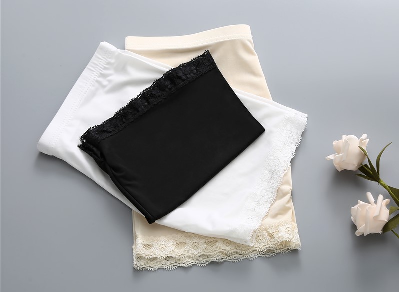Quần đùi nữ màu đen tóm tắt phương thức mid-eo an toàn liền mạch quần short màu thịt phẳng phẳng chống đi quần short bò nữ