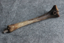 Horse bandit in the northwest of the Republic of China. Old tobacco bag modified with a sheep bone copper bullet. Smoking gun 20 cm long ZZ 554